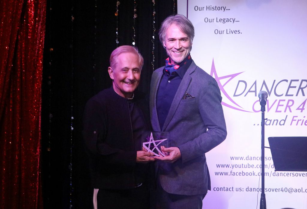 DO40 prez John Sefakis with Michael Bunch, accepting the award for Gene Foote, who was unable to attend that evening.